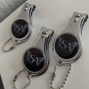 CHAVEIRO CORTADOR DE UNHA METAL RESINADO